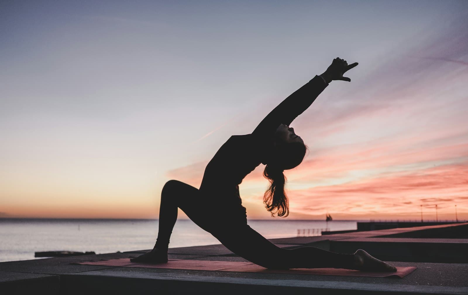 Person stretching at a desk
